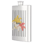 Fleurs blanches jaunes orange sur flacon à rayures (Gauche)