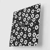 Fleurs blanches noires mignonnes Horloge murale (Angle)