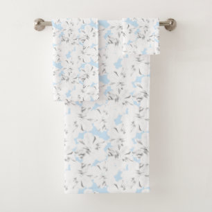 Fleurs blanches sur bleu clair.