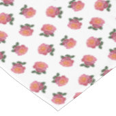 Fleurs de rose rose sur nappe blanche (Angle)