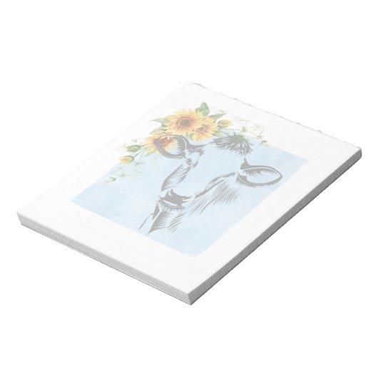 Fleurs de soleil et vache sur le bloc-notes (Tourné)