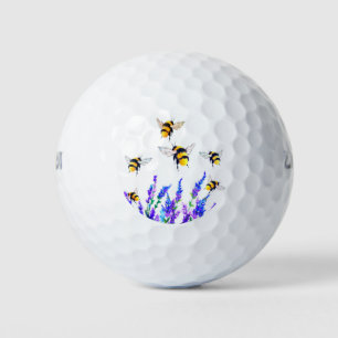 Fleurs et balles de golf des abeilles volantes