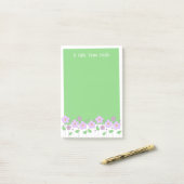 Fleurs Lilac et notes vertes post-it (Sur un bureau)