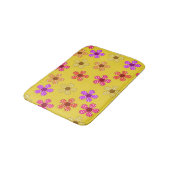 Fleurs pointillées sur tapis de bain jaune (Angle)