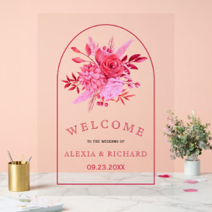 Fleurs roses et arc fleuri accueil mariage