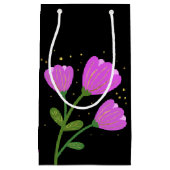 Fleurs roses sur sac cadeau noir (Devant)