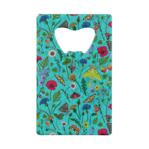 Fleurs sauvages et papillons de nuit sur turquoise