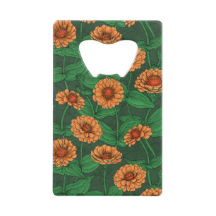 Fleurs Zinnia orange, feuilles verts sur vert fonc