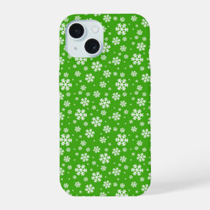 Flocons blancs sur motif vert d'hiver