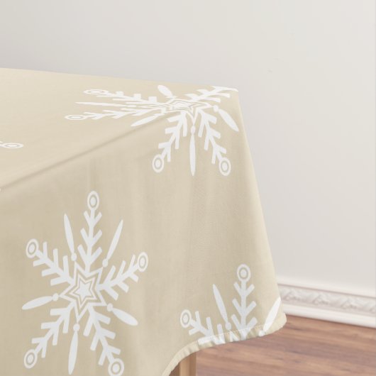 Flocons de neige blancs sur la nappe beige de Noël (In Situ)