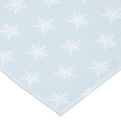 Flocons de neige blancs sur la nappe bleue de Noël (Angle)