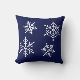 Flocons de neige blancs sur un coussin décoratif b