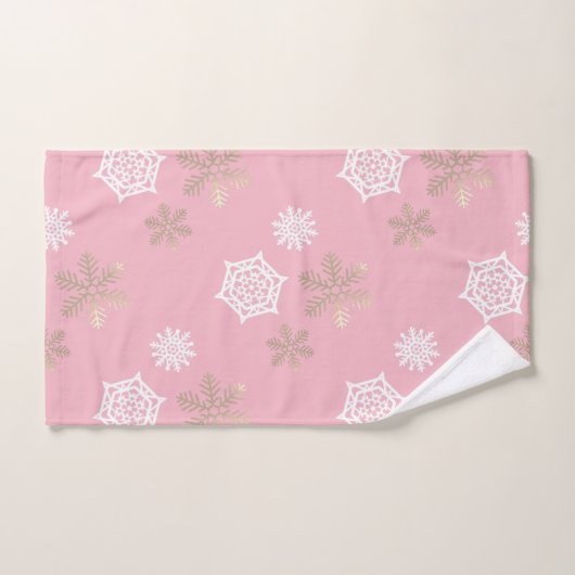 flocons dorés et blancs contre rose pâle (Serviette à main)