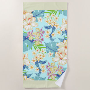 Flore tropicale avec une serviette de plage à la b