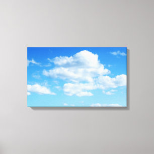 Fluffy Clouds en Blue Sky Canvas Afdruk
