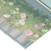 Fluffy kitten met blauwe boog bij banketbakkerij tafelkleed (Gekanteld)