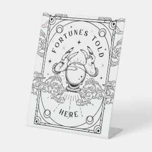 Fortunes vertelde het hier reclamebord met voetstuk