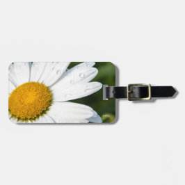 foto, een margriet, groene achtergrond bagagelabel