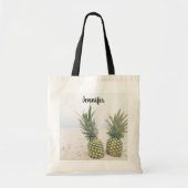 Foto van 2 ananassen op een strand tote bag (Voorkant)