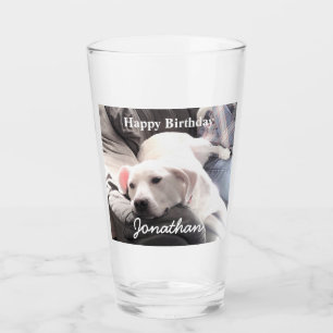 Foto van Cute Tired White Dog met Best Friend Dad Glas