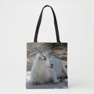 Foto van Cute White Goat Laing Draagtas