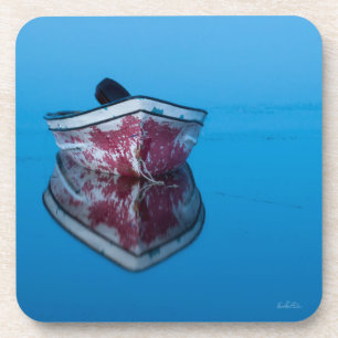 foto van een boot op het water onderzetter