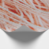 Foto van lichtkoraalroze garen cadeaupapier (Hoek)