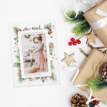 Foto van rozebottels en hulstbessen als kerstgroen