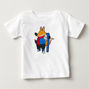 Fox als skiër met skiën