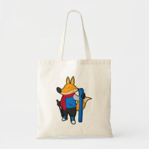 Fox als skiër met skiën tote bag