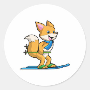 Fox als skiër met skipolen ronde sticker