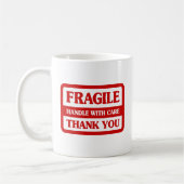 Fragile handgreep met zorg koffiemok (Links)