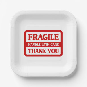 Fragile handgreep met zorg papieren bordje
