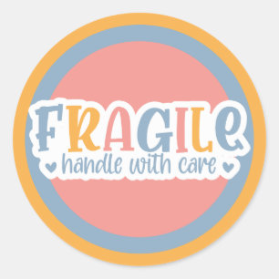 Fragile handgreep met zorg ronde sticker