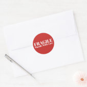 Fragile handgreep met zorg ronde sticker (Envelop)