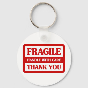 Fragile handgreep met zorg sleutelhanger