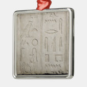 Fragment van een hiërarchisch inscriptie metalen ornament (Links)