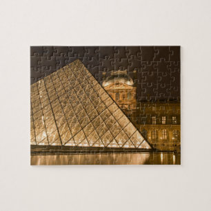 Frankrijk, Parijs. De Louvre bij schemering. Credi Legpuzzel