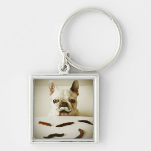 Franse hond met een snor sleutelhanger