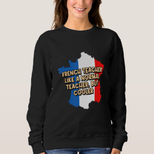 Franse leraar is normaal, maar cooler grappig onde trui