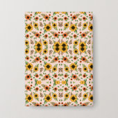 Front and back views of a floral-patterned  button (Voorkant)