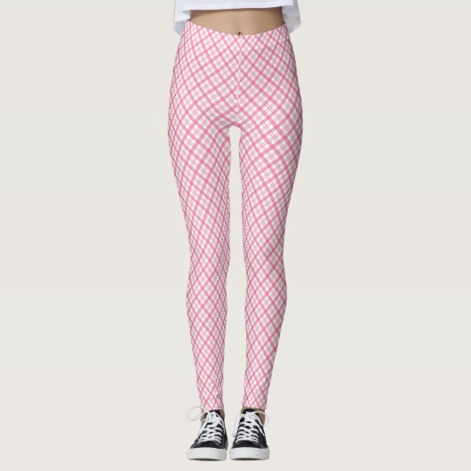 Front and back views of pink plaid leggings worn  (Devant)