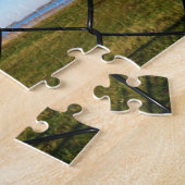 Fubby's die een hek beklimmen. legpuzzel (Zijkant)