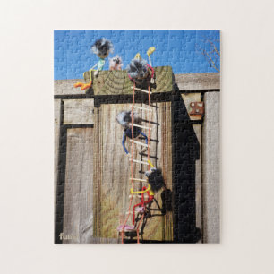 Fubby's die een vogelhuis beklimmen. legpuzzel
