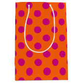 Fuchsia polka-punten op sinaasappel medium cadeauzakje (Voorkant)