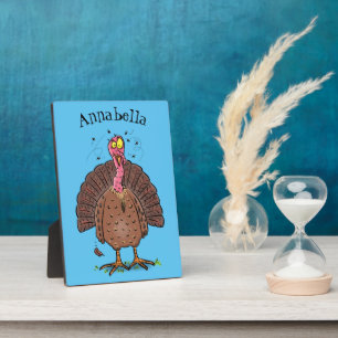 Funny brown farmyard turkey met vliegende cartoon fotoplaat