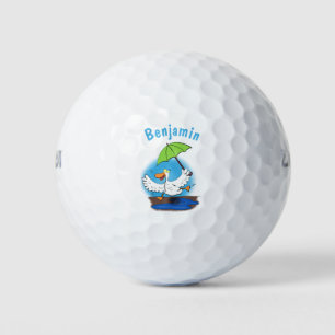Funny eend met paraplu dansende cartoon golfballen