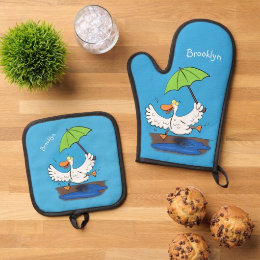 Funny eend met paraplu dansende cartoon ovenwant & pannenlap set (Top down)