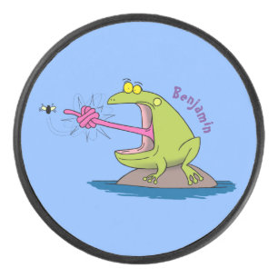Funny frog en cartoon hockey puck