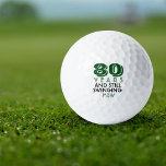 Funny Golf Balls 80e fête d'anniversaire Monogramm<br><div class="desc">Votre golfeur qui a quatre-vingts ans va se faire rire de ces balles de golf personnalisées. Dispose d'un design avec le texte "80 ans et toujours en mouvement". (Vous pouvez modifier le nombre en n'importe quelle année et la couleur à votre choix.) Personnalisez avec des initiales monogrammées, le nom ou...</div>